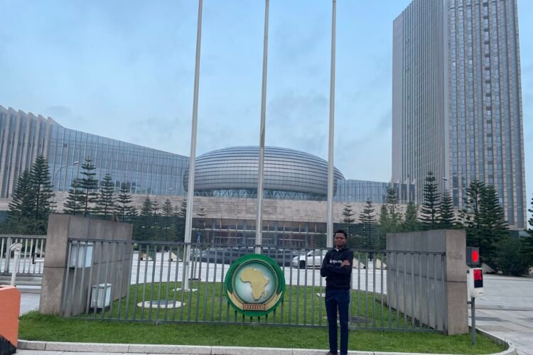 David Muanda poses for a picture at the headquarters of the African Union in Addis Ababa, Ethiopia